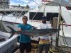 Capt Rod and Bobby with a huge kingfish caught aboard the New Lattitude.JPG